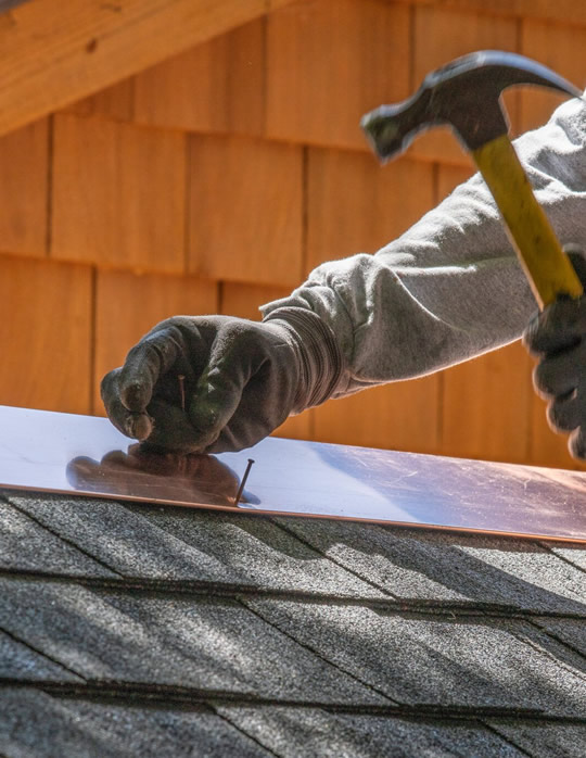 photo of a roof being repaired